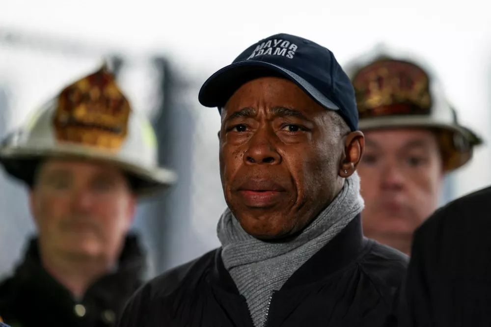 New York City Mayor Eric Adams attends a press conference, after a helicopter crash on the Hudson River near lower Manhattan, in New York, U.S., April 10, 2025. REUTERS/Jeenah Moon