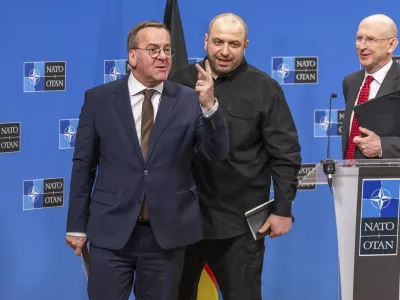 Germany's Defense Minister Boris Pistorius, left, Ukraine's Defense Minister Rustem Umerov, center, and Britain's Defense Secretary John Healey, attend a news conference after a meeting of the Ukraine Defence Contact Group at NATO headquarters in Brussels, Friday, April 11, 2025. (AP Photo/Geert Vanden Wijngaert)