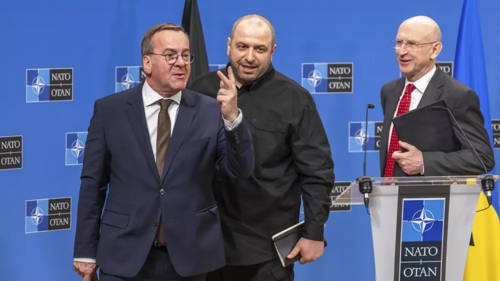 Germany's Defense Minister Boris Pistorius, left, Ukraine's Defense Minister Rustem Umerov, center, and Britain's Defense Secretary John Healey, attend a news conference after a meeting of the Ukraine Defence Contact Group at NATO headquarters in Brussels, Friday, April 11, 2025. (AP Photo/Geert Vanden Wijngaert)
