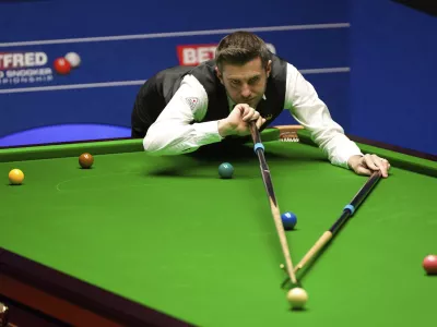 ﻿England's Mark Selby plays a shot on the way to winning the World Snooker Championships at the Crucible Theatre in Sheffield, England, Monday, May 3, 2021. (Zac Goodwin/PA via AP)