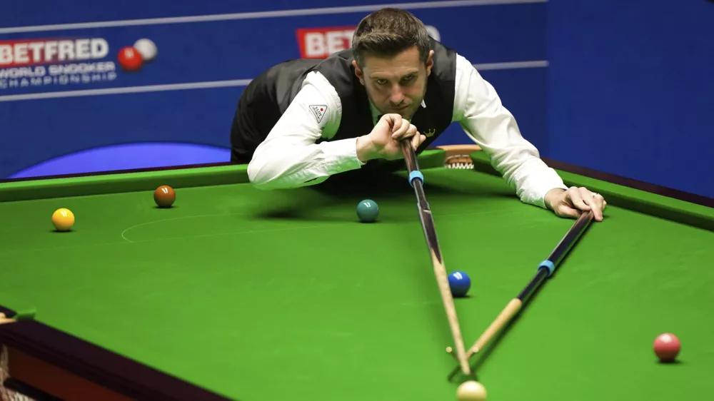 ﻿England's Mark Selby plays a shot on the way to winning the World Snooker Championships at the Crucible Theatre in Sheffield, England, Monday, May 3, 2021. (Zac Goodwin/PA via AP)