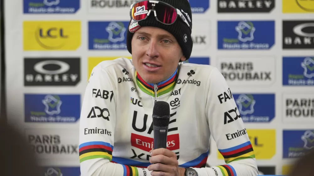 Tadej Pogacar, of Slovenia, speaks with the media after finishing second in the Paris-Roubaix cycling race in Roubaix, France, Sunday, April 13, 2025. (AP Photo/Thibault Camus)