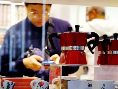 Models of Italy's iconic stove-top Moka coffee maker, Bialetti, are pictured in a store in Rome on October 31, 2018 as the brand has sought protection from creditors while it negotiates an injection of funds to shift to growth products including capsule systems. The octagonal metal pot that sends steam up through ground coffee became a paragon of Italian design as well as the preferred method for generations of Italians to make their morning expresso. While an updated model remains popular, sales slumped 12 percent in the first half of the year due to shifts in the market and financial difficulties that led to supply problems. Bialetti racked up a net loss of 15.3 million euros (.2 million).,Image: 393532846, License: Rights-managed, Restrictions: TO GO WITH AFP STORY MADE BY CELINE CORNU, Model Release: no