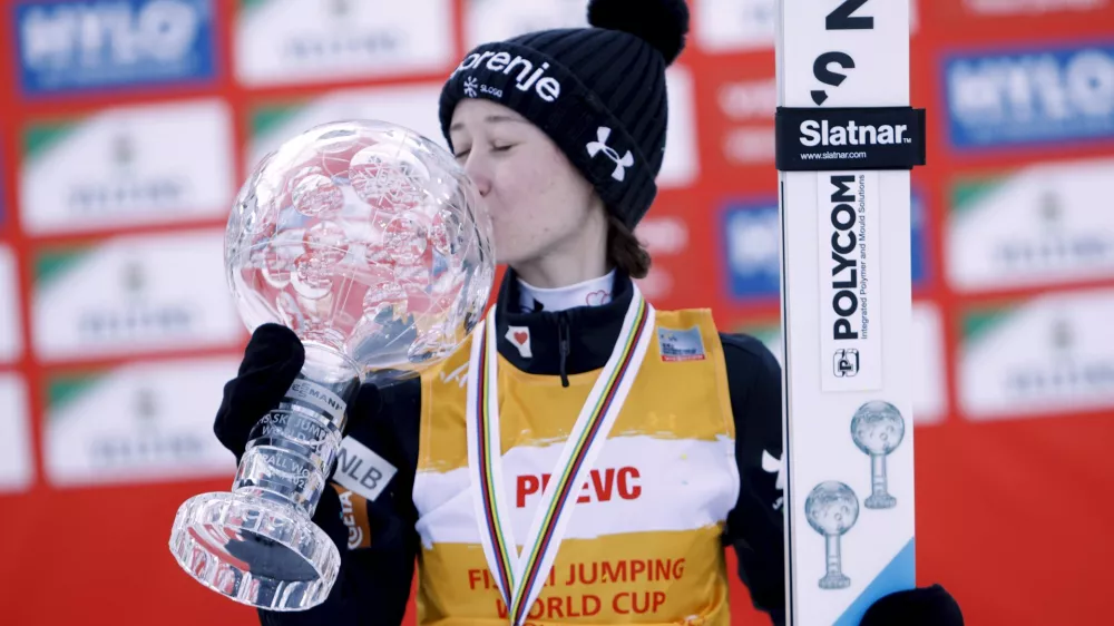 21 March 2025, Finland, Lahti: Slovenia's Nika Prevc celebrates with World Cup overall victory with the Crystal Ball after the women's HS130 ski jumping competition at the FIS Nordic World Cup in Lahti. Photo: Pepe Korteniemi/Lehtikuva/dpa