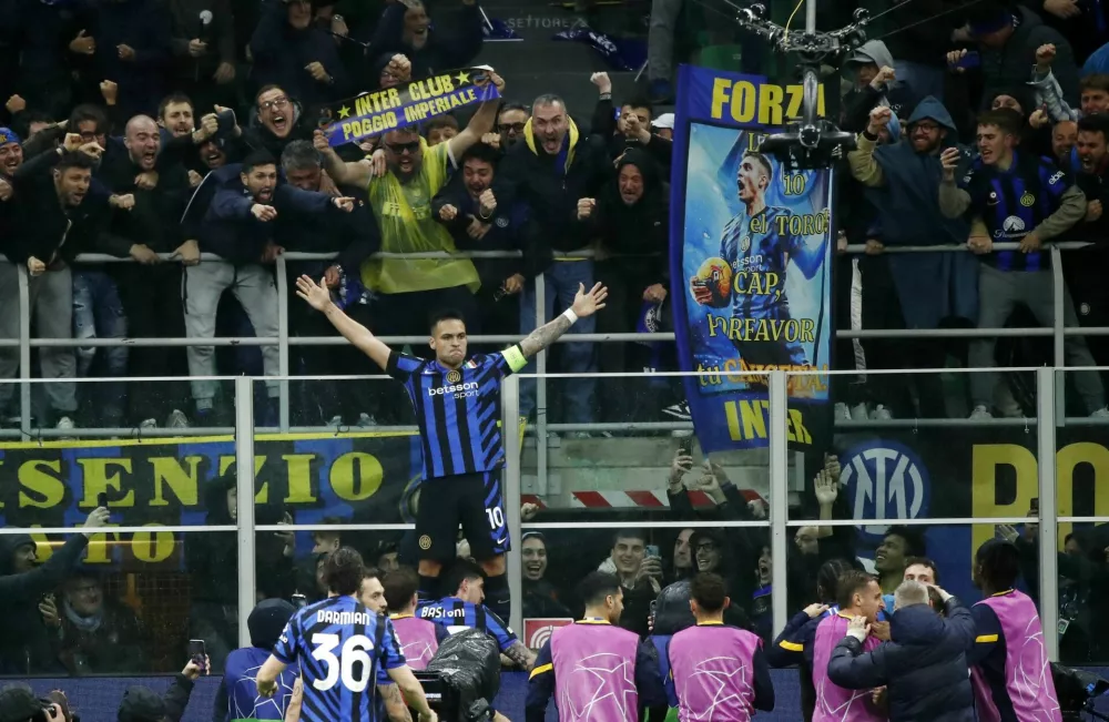 Soccer Football - Champions League - Quarter Final - Second Leg - Inter Milan v Bayern Munich - San Siro, Milan, Italy - April 16, 2025 Inter Milan's Lautaro Martinez celebrates scoring their first goal REUTERS/Alessandro Garofalo