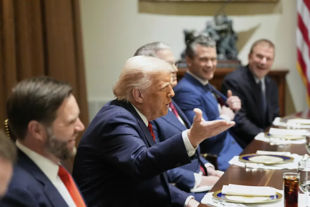 President Donald Trump speaks before a luncheon with Italy's Prime Minister Giorgia Meloni in the Cabinet Room of the White House, Thursday, April 17, 2025, in Washington, as from left, Vice President JD Vance, Treasury Secretary Scott Bessent, Defense Secretary Pete Hegseth and U.S. Ambassador to Italy nominee Tilman Fertitta listen. (AP Photo/Alex Brandon)