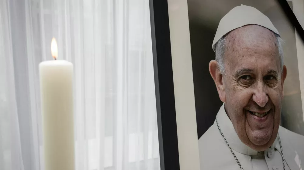 A photograph of Pope Francis is seen at the Apostolic Nunciature, on the day that German president Steinmeier signs a book of condolences for Pope Francis in Berlin, Germany, April 25, 2025. REUTERS/ Nadja Wohlleben NO RESALES. NO ARCHIVES