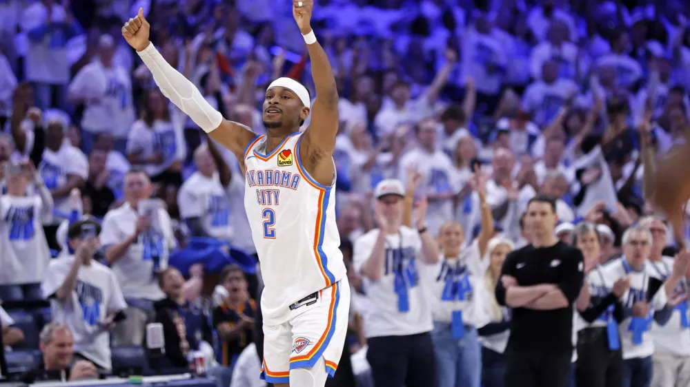 Oklahoma City Thunder guard Shai Gilgeous-Alexander reacts after making a basket during the first half in Game 1 of an NBA first-round playoff series against the Memphis Grizzlies, Sunday, April 20, 2025, in Oklahoma City. (AP Photo/Nate Billings)