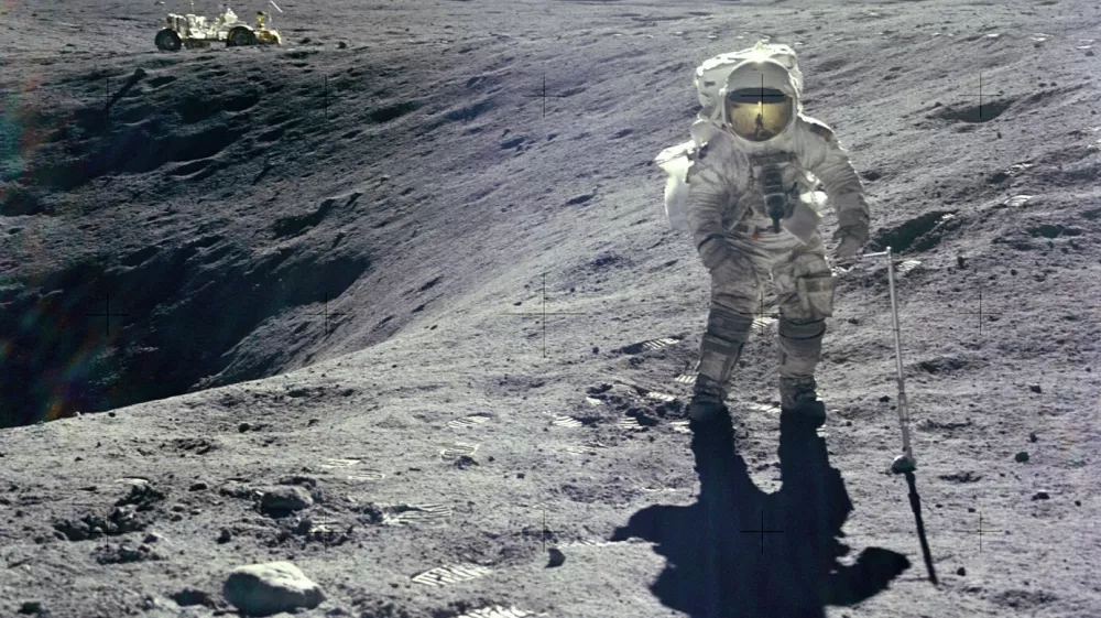 Astronaut Charles M Duke Jr Lunar Module pilot of the Apollo 16 mission is photographed collecting lunar samples at Station no 1 during the first Apollo 16 extravehicular activity at the Descartes landing site This picture looking eastward was taken by Astronaut John W Young commander Duke is standing at the rim of Plum crater which is 40 meters in diameter and 10 meters deep The parked Lunar Roving Vehicle can be seen in the left background,Image: 11915041, License: Rights-managed, Restrictions:, Model Release: noFoto: Profimedia