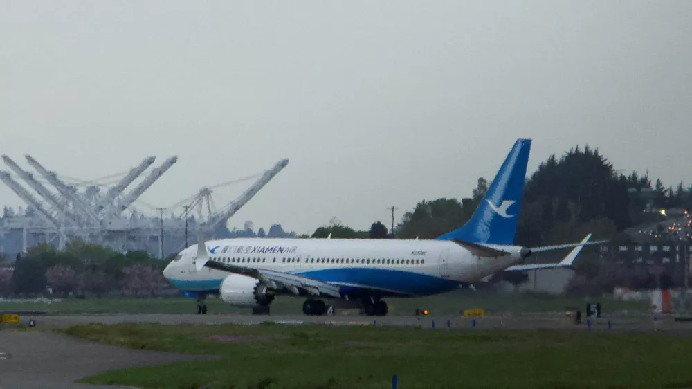 FILE PHOTO: A Boeing 737 MAX plane, intended for China's Xiamen Airlines, arrives at King County International Airport after returning from China due to ongoing tariff disputes, in Seattle, Washington, U.S. April 19, 2025. REUTERS/Dan Catchpole/File Photo