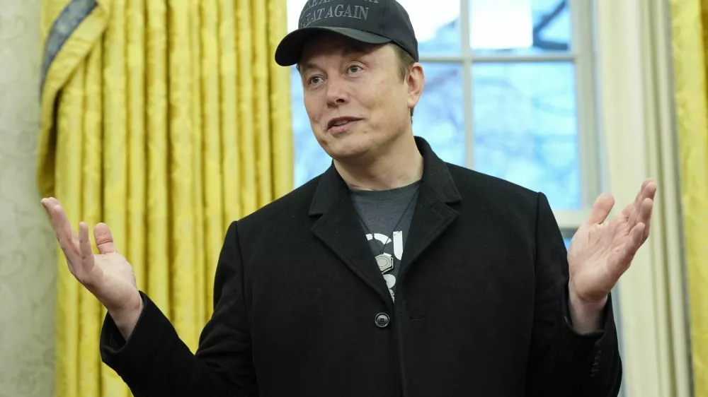 FILE - Elon Musk speaks during an event with President Donald Trump in the Oval Office at the White House, Feb. 11, 2025, in Washington. (AP Photo/Alex Brandon, File)