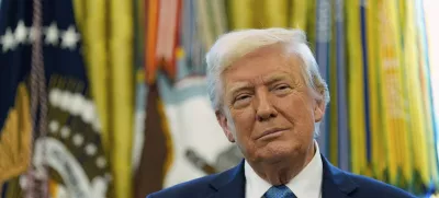 President Donald Trump watches as Treasury Secretary Scott Bessent participates in a ceremonial swearing in of Paul Atkins as chairman of the Securities and Exchange Commission, in the Oval Office of the White House, Tuesday, April 22, 2025, in Washington. (AP Photo/Alex Brandon)