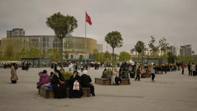 People gather outdoors following an earthquake shock with a preliminary magnitude of 6.2, in Istanbul, Turkey, Wednesday, April 23, 2025. (AP Photo/Khalil Hamra)