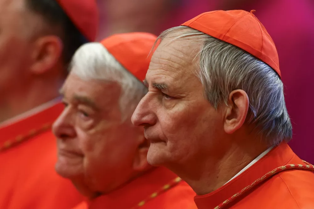 Cardinal Matteo Zuppi looks on, on the day of the translation of Pope Francis' body, in St. Peter's Basilica at the Vatican, April 23, 2025. REUTERS/Yara Nardi