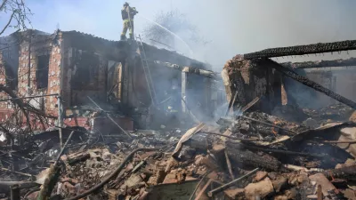 Rescuers work at the site of a Russian airstrike, amid Russia's attack on Ukraine, in the town of Sloviansk, Donetsk region Ukraine April 23, 2025. REUTERS/Anatolii Stepanov