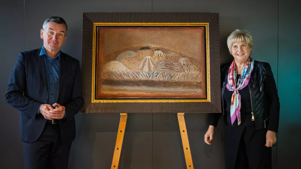 Dr. Stojan Pelko, programski vodja evropske prestolnice kulture 2025, in dr. Nelida Nemec, kustosinja razstav o Zoranu Mušiču Foto: Jernej Humar