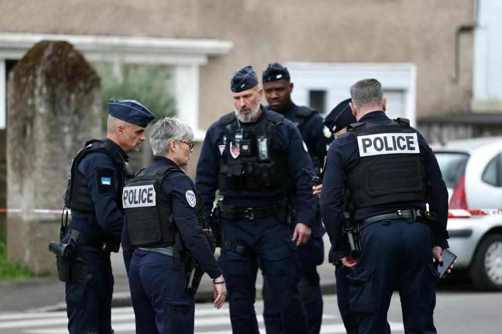 French police secure the area near the Notre-Dame-de-Toutes-Aides high school after one student was killed and other students injured in a school stabbing, in Nantes, France, April 24, 2025. REUTERS/Stephane Mahe