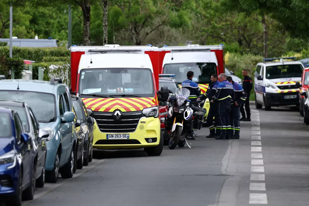French police secure the area near the Notre-Dame-de-Toutes-Aides high school after one student was killed and other students injured in a school stabbing, in Nantes, France, April 24, 2025. REUTERS/Stephane Mahe