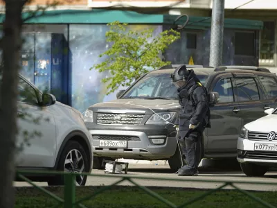 A sapper works at the scene where Lt. Gen. Yaroslav Moskalik, a deputy head of the main operational department in the General Staff of the Russian armed forces, was killed by an explosive device placed in a car in Balashikha, just outside Moscow, Russia, on Friday, April 25, 2025. (AP Photo)