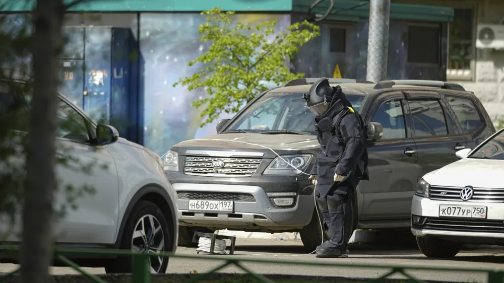 A sapper works at the scene where Lt. Gen. Yaroslav Moskalik, a deputy head of the main operational department in the General Staff of the Russian armed forces, was killed by an explosive device placed in a car in Balashikha, just outside Moscow, Russia, on Friday, April 25, 2025. (AP Photo)