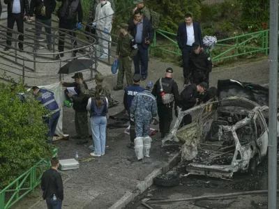 Investigators work at the scene where Lt. Gen. Yaroslav Moskalik, a deputy head of the main operational department in the General Staff of the Russian armed forces, was killed by an explosive device placed in his car in Balashikha, just outside Moscow, Russia, on Friday, April 25, 2025. (AP Photo)