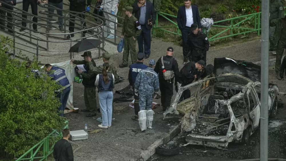 Investigators work at the scene where Lt. Gen. Yaroslav Moskalik, a deputy head of the main operational department in the General Staff of the Russian armed forces, was killed by an explosive device placed in his car in Balashikha, just outside Moscow, Russia, on Friday, April 25, 2025. (AP Photo)