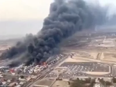 An aerial view shows plumes of smoke rising, following a suspected explosion of chemical materials which killed multiple people and injured many others, in Bandar Abbas, Iran, in this screengrab obtained from a social media video released on April 27, 2025. Social Media/via REUTERS THIS IMAGE HAS BEEN SUPPLIED BY A THIRD PARTY. NO RESALES. NO ARCHIVES. MANDATORY CREDIT