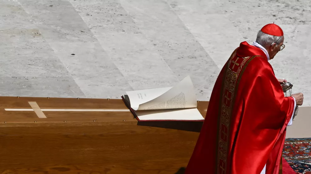 Cardinal Giovanni Battista Re blesses the coffin as he leads the funeral Mass of Pope Francis, in Saint Peter's Square, at the Vatican, April 26, 2025. REUTERS/Dylan Martinez