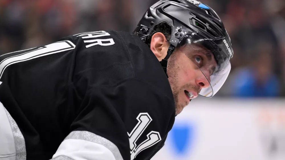 Apr 5, 2025; Los Angeles, California, USA; Los Angeles Kings center Anze Kopitar (11) during a break in the action against the Edmonton Oilers at Crypto.com Arena. Mandatory Credit: Robert Hanashiro-Imagn Images