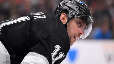 Apr 5, 2025; Los Angeles, California, USA; Los Angeles Kings center Anze Kopitar (11) during a break in the action against the Edmonton Oilers at Crypto.com Arena. Mandatory Credit: Robert Hanashiro-Imagn Images