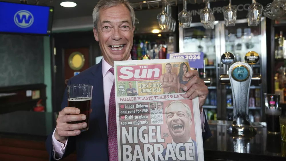 Leader of Reform UK Nigel Farage speaks to the media following the launch of his General Election campaign in Clacton-on-Sea, Essex, England, Tuesday June 4, 2024. Mr Farage announced on Monday that he will stand for parliament in Clacton and lead Reform UK for the next five years. (James Manning/PA via AP)