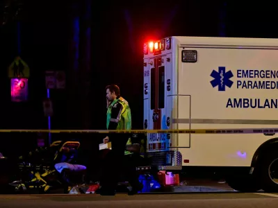 An ambulance is parked at the site of the Lapu Lapu day block party, where a vehicle drove into a crowd killing several people in Vancouver, British Columbia, Canada April 26, 2025. REUTERS/Jennifer Gauthier
