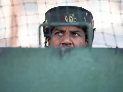 An Indian security force personnel stands guard on a street, following a suspected militant attack near south Kashmir's Pahalgam, in Srinagar, April 28, 2025. REUTERS/Adnan Abidi