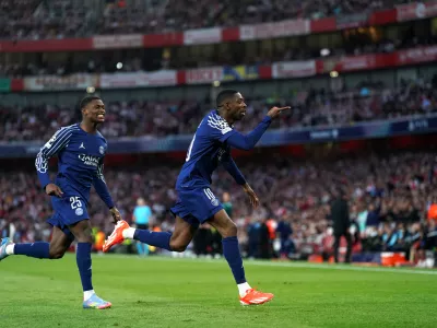 29 April 2025, United Kingdom, London: Paris Saint Germain's Ousmane Dembele (R) celebrates scoring his side's first goal of the game during the UEFA Champions League semi final, first leg match between Arsenal and Paris Saint Germain at the Emirates Stadium. Photo: Adam Davy/PA Wire/dpa