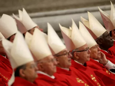 Cardinal Peter Turkson and other cardinals attend a mourning Mass for late Pope Francis on the fourth day of Novendiali (nine days of mourning after the Pope's funeral) at St. Peter's Basilica at the Vatican, April 29, 2025. REUTERS/Stoyan Nenov   TPX IMAGES OF THE DAY