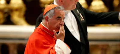 FILE PHOTO: Cardinal Angelo Becciu arrives at a consistory ceremony to elevate Roman Catholic prelates to the rank of cardinal, at Saint Peter's Basilica at the Vatican, August 27, 2022. REUTERS/Remo Casilli/File Photo