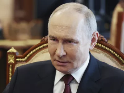 Russian President Vladimir Putin speaks with Russian Chief of General Staff Gen. Valery Gerasimov during their meeting at the Kremlin in Moscow, Russia, Saturday, April 19, 2025. (Vyacheslav Prokofyev, Sputnik, Kremlin Pool Photo via AP)