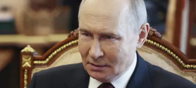 Russian President Vladimir Putin speaks with Russian Chief of General Staff Gen. Valery Gerasimov during their meeting at the Kremlin in Moscow, Russia, Saturday, April 19, 2025. (Vyacheslav Prokofyev, Sputnik, Kremlin Pool Photo via AP)