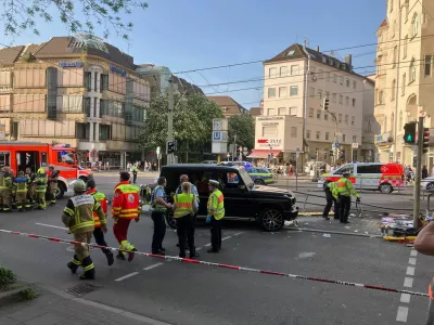 02 May 2025, Baden-Württemberg, Stuttgart: Police officers and emergency workers present at the scene where a car drove into people. According to police, a car has driven into a group of people in Stuttgart city center. Three people have been injured so far. The driver has been arrested, a police spokeswoman said. Photo: Marco Krefting/dpa