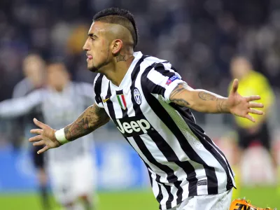 ﻿Juventus midfielder Arturo Vidal celebrates after scoring during the Champions League, Group B, soccer match between Juventus and Copenaghen at the Juventus stadium, in Turin, Italy, Wednesday, Nov. 27, 2013. Juventus won 3-1 and Vidal scored an hat-trick. (AP Photo/Massimo Pinca)