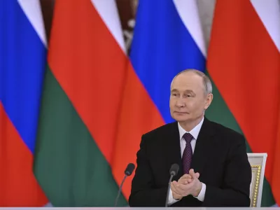 Russian President Vladimir Putin attends a signing ceremony with Oman's Sultan Haitham bin Tariq Al Said, following their talks at the Grand Kremlin Palace in Moscow, on Tuesday, April 22, 2025. (Kristina Kormilitsyna, Sputnik, Kremlin Pool Photo via AP)