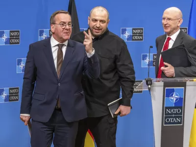 Germany's Defense Minister Boris Pistorius, left, Ukraine's Defense Minister Rustem Umerov, center, and Britain's Defense Secretary John Healey, attend a news conference after a meeting of the Ukraine Defence Contact Group at NATO headquarters in Brussels, Friday, April 11, 2025. (AP Photo/Geert Vanden Wijngaert)