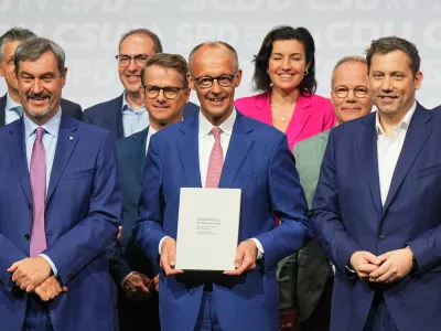 05 May 2025, Berlin: Christian Democratic Union (CDU) Chairman and candidate for Chancellor Friedrich Merz (C), Christian Social Union Chairman Markus Soeder (L) and Social Democratic Party (SPD) Chairman Lars Klingbeil, designated German Minister of Finance and Vice-Chancellor, pose for a photo after signing the coalition agreement between the CDU, CSU and SPD to form a new federal government. Photo: Michael Kappeler/dpa