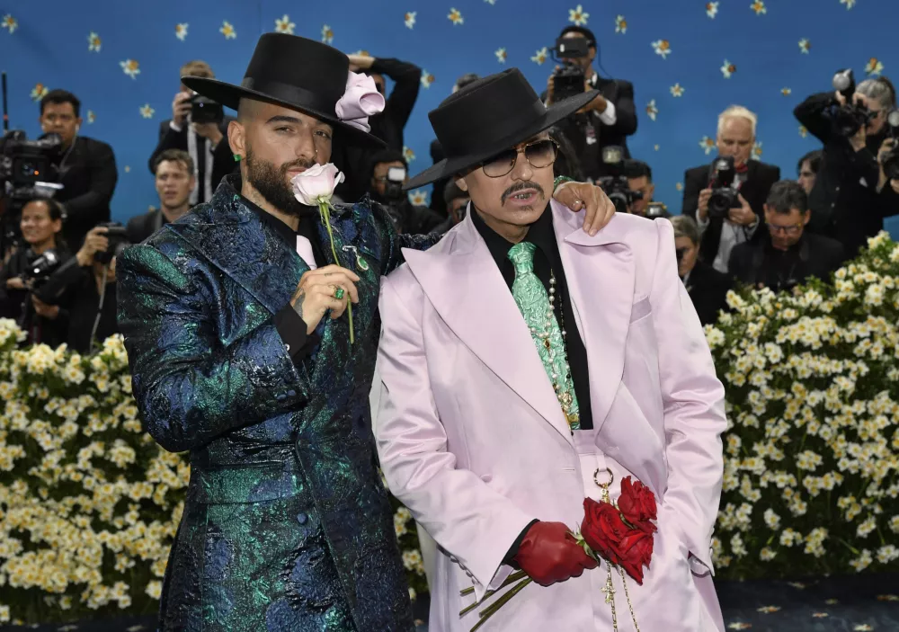 Maluma, left and Willy Chavarria attend The Metropolitan Museum of Art's Costume Institute benefit gala celebrating the opening of the "Superfine: Tailoring Black Style" exhibition on Monday, May 5, 2025, in New York. (Photo by Evan Agostini/Invision/AP)