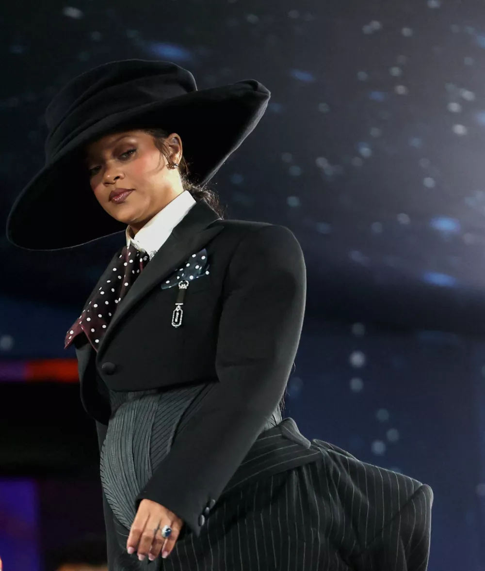 Rihanna poses during the Met Gala, an annual fundraising gala held for the benefit of the Metropolitan Museum of Art's Costume Institute with this year's theme 'Superfine: Tailoring Black Style,' in New York City, New York, U.S., May 5, 2025. REUTERS/Mario Anzuoni