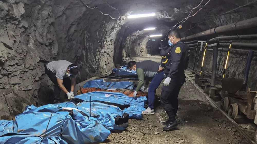 Handout picture released by La Libertad Police on May 4, 2025, shows police officers next to the bodies of 13 workers found dead inside a gold mine in Pataz, northwestern Peru. Thirteen people were found dead inside a mine in Peru after being kidnapped days earlier in the northern area of Pataz, the mining company Poderosa said Sunday.,Image: 995193060, License: Rights-managed, Restrictions: RESTRICTED TO EDITORIAL USE - MANDATORY CREDIT "AFP PHOTO / La Ibertad Police / HANDOUT / " - NO MARKETING NO ADVERTISING CAMPAIGNS - DISTRIBUTED AS A SERVICE TO CLIENTS, ***HANDOUT image or SOCIAL MEDIA IMAGE or FILMSTILL for EDITORIAL USE ONLY! * Please note: Fees charged by Profimedia are for the Profimedia's services only, and do not, nor are they intended to, convey to the user any ownership of Copyright or License in the material. Profimedia does not claim any ownership including but not limited to Copyright or License in the attached material. By publishing this material you (the user) expressly agree to indemnify and to hold Profimedia and its directors, shareholders and employees harmless from any loss, claims, damages, demands, expenses (including legal fees), or any causes of action or allegation against Profimedia arising out of or connected in any way with publication of the material. Profimedia does not claim any copyright or license in the attached materials. Any downloading fees charged by Profimedia are for Profimedia's services only. * Handling Fee Only ***, Model Release: no