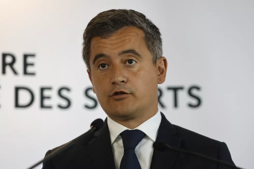 rench Interior Minister Gerald Darmanin speaks during a press conference Monday, May 30, 2022 in Paris. The British government says it's deeply concerned over the treatment of Liverpool supporters by French authorities, who blamed fans for unrest at the Champions League final amid overcrowding outside the Stade de France. (AP Photo/Jean-Francois Badias)