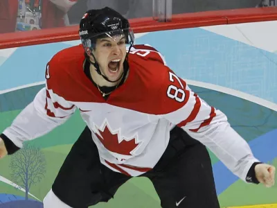 Canada's Sidney Crosby celebrates after scoring the game winning goal against the U.S. during overtime in their men's ice hockey gold medal game at the Vancouver 2010 Winter Olympics February 28, 2010.   REUTERS/Todd Korol (CANADA)