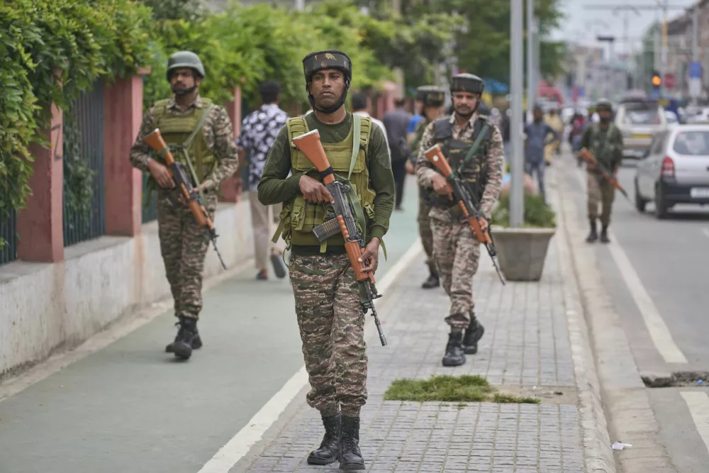 Indian paramilitary soldiers patrol in Srinagar, Indian controlled Kashmir, Thursday, May 1, 2025. (AP Photo/Dar Yasin)
