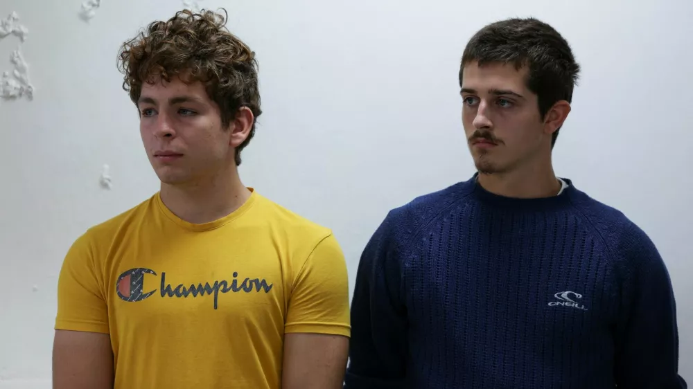 Belgium nationals David Lornoy and Seppe Lodewijckx react during their sentencing, after they pleaded guilty of illegal possession and trafficking of garden ants, they were both fined U.S. dollars 7,700 or one year imprisonment, at the Jomo Kenyatta International Airport (JKIA) Law Courts, in Nairobi, Kenya May 7, 2025. REUTERS/Monicah Mwangi